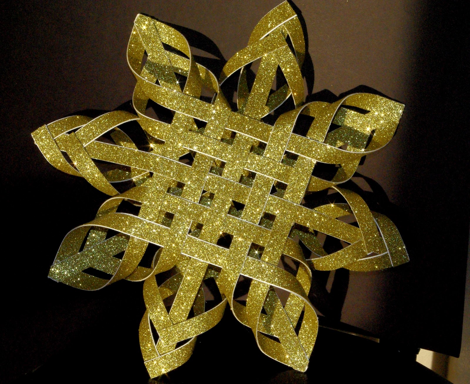 Paper star tree topper · How to Make a 3D Paper Snowflake. Three dimensional paper snowflakes look beautiful hanging in a window or on a wall. Fun for kids or adults, they are easy to make. Some like them for Christmas, but you may like them any time! Gather.